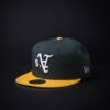 Gorra New Era 9Fifty Oakland Athletics Snapback Color Verde/Amarillo
