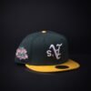 Gorra New Era 9Fifty Oakland Athletics Snapback Color Verde/Amarillo