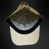 Gorra Black Clover Iron X En Color Verde Oliva Con Trébol Blanco Dorado.